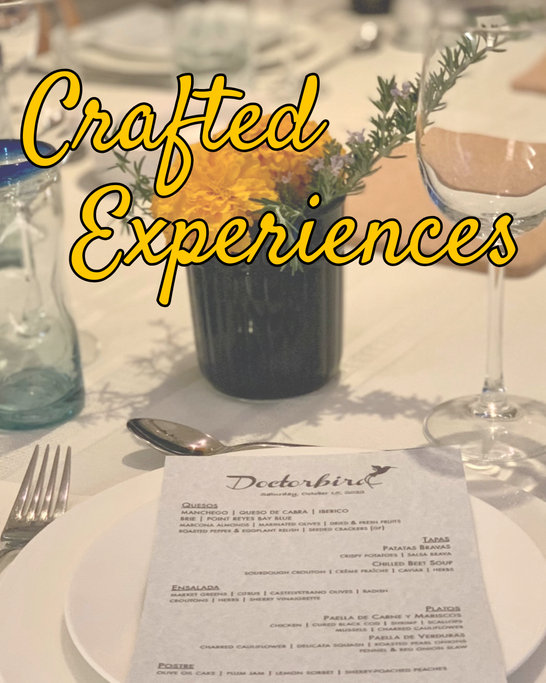 Dining table setting with a 'Doctorbird' menu card, flowers, and wine glass, featuring 'Crafted Experiences' text.